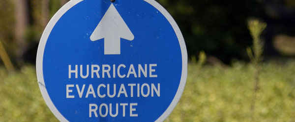 Graphic of a road sign with an arrow pointing towards a Coastal Evacuation route